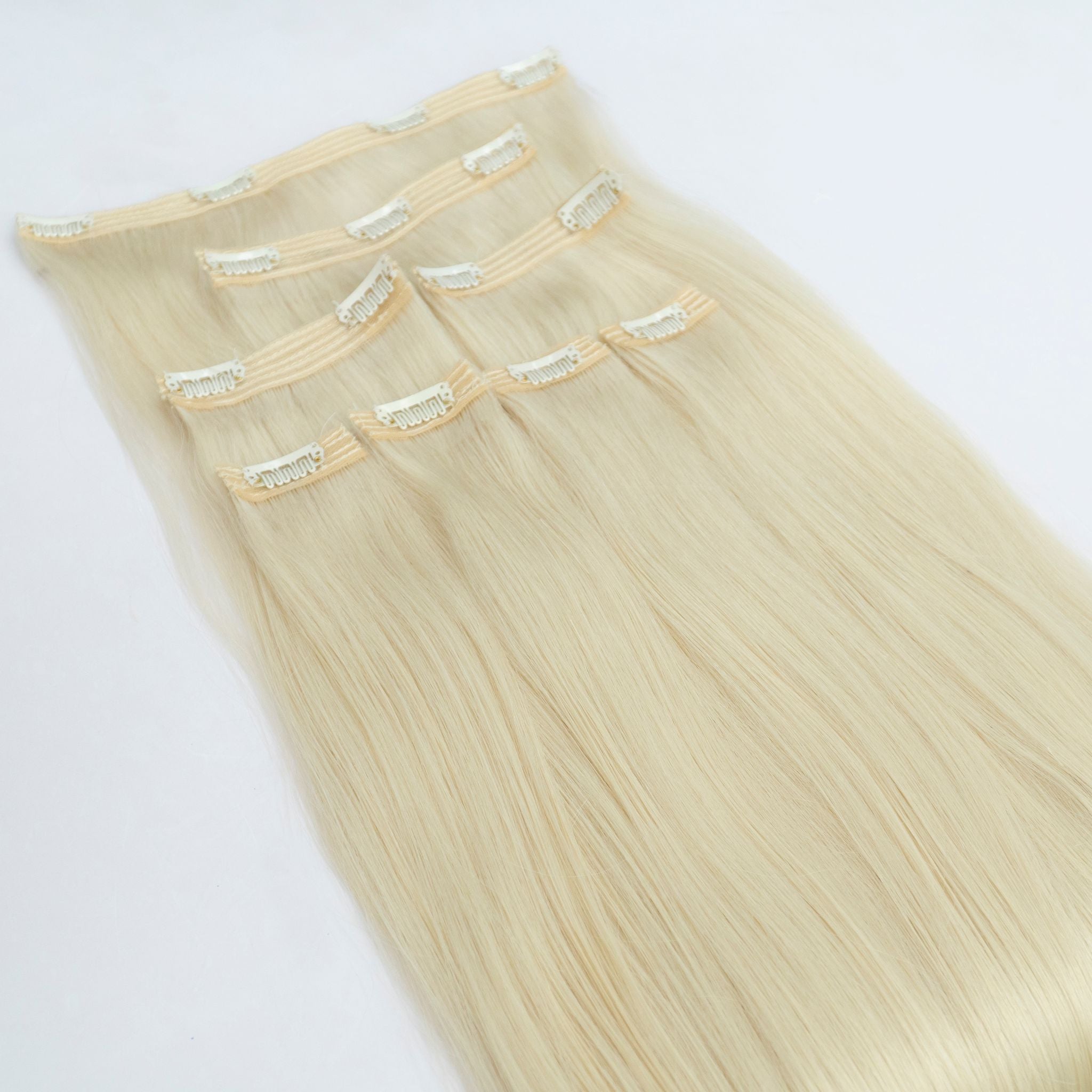 Extensii din păr rusesc Clip-On blond deschis